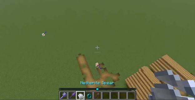 Minecraft gameplay with a custom spear